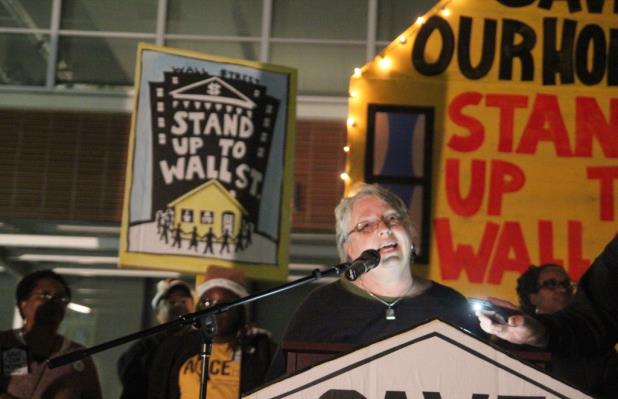 Richmond Mayor Gayle McLaughlin speaks to the supporters of the city's housing recovery plan. 'Every foreclosure is someone's work going down the drain,' she said. 'Let's keep fighting the good fight together.' (Photo by: Kevin N. Hume)